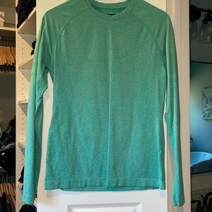 Figs under scrub shirt